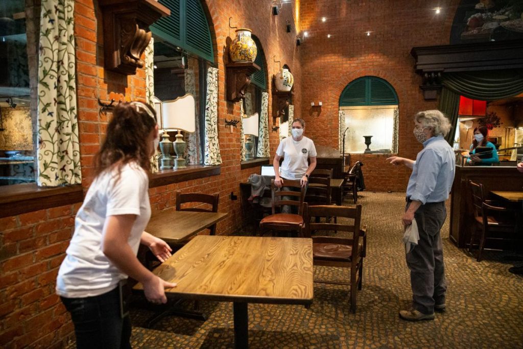 Employees moving table