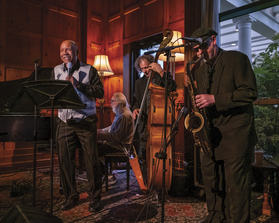 Jazz on Thursdays 6-9 PM, Photo of Clinton Horton singing jazz with the O.Henry Trio